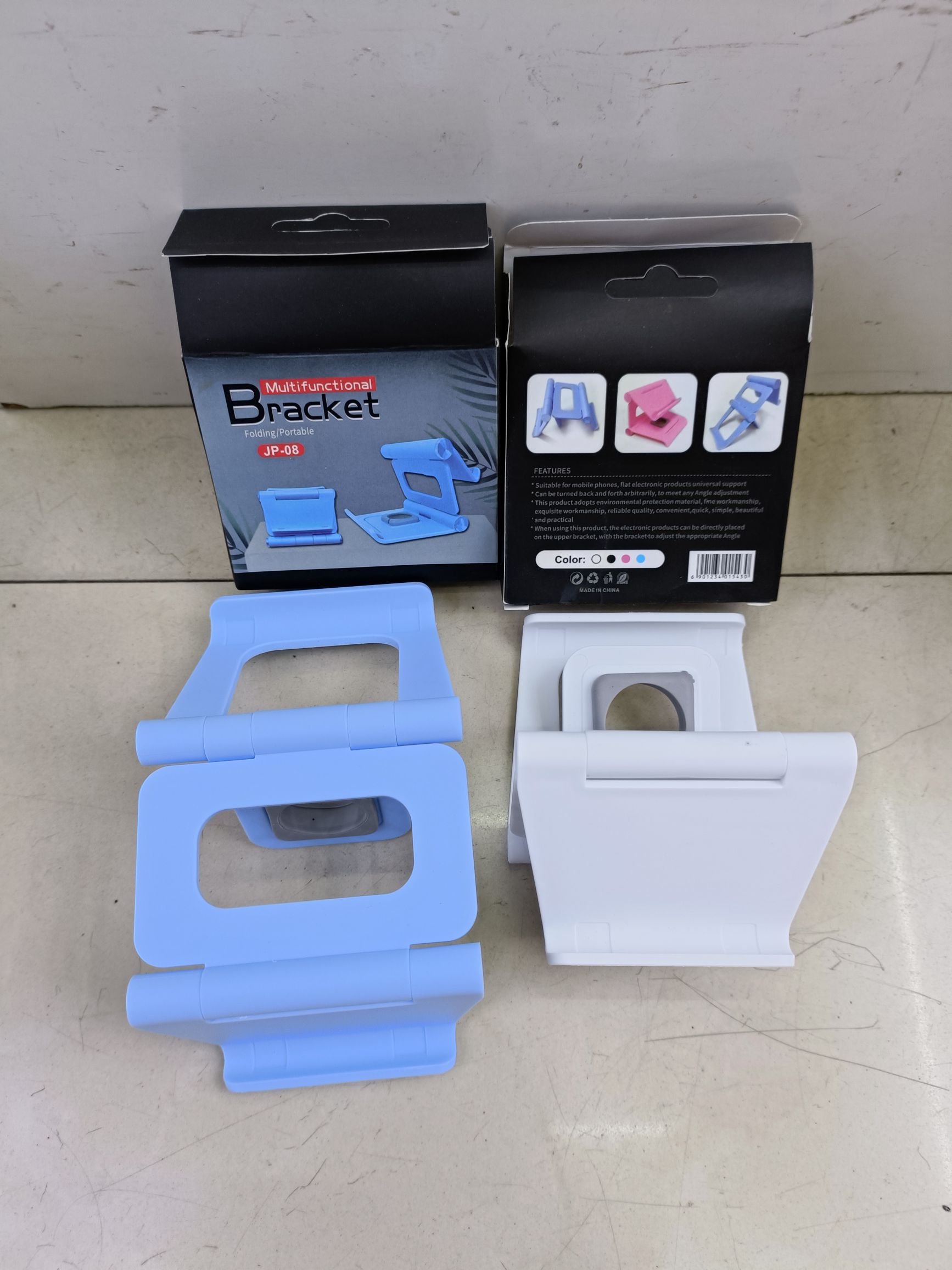 Multifunctional foldable phone stand