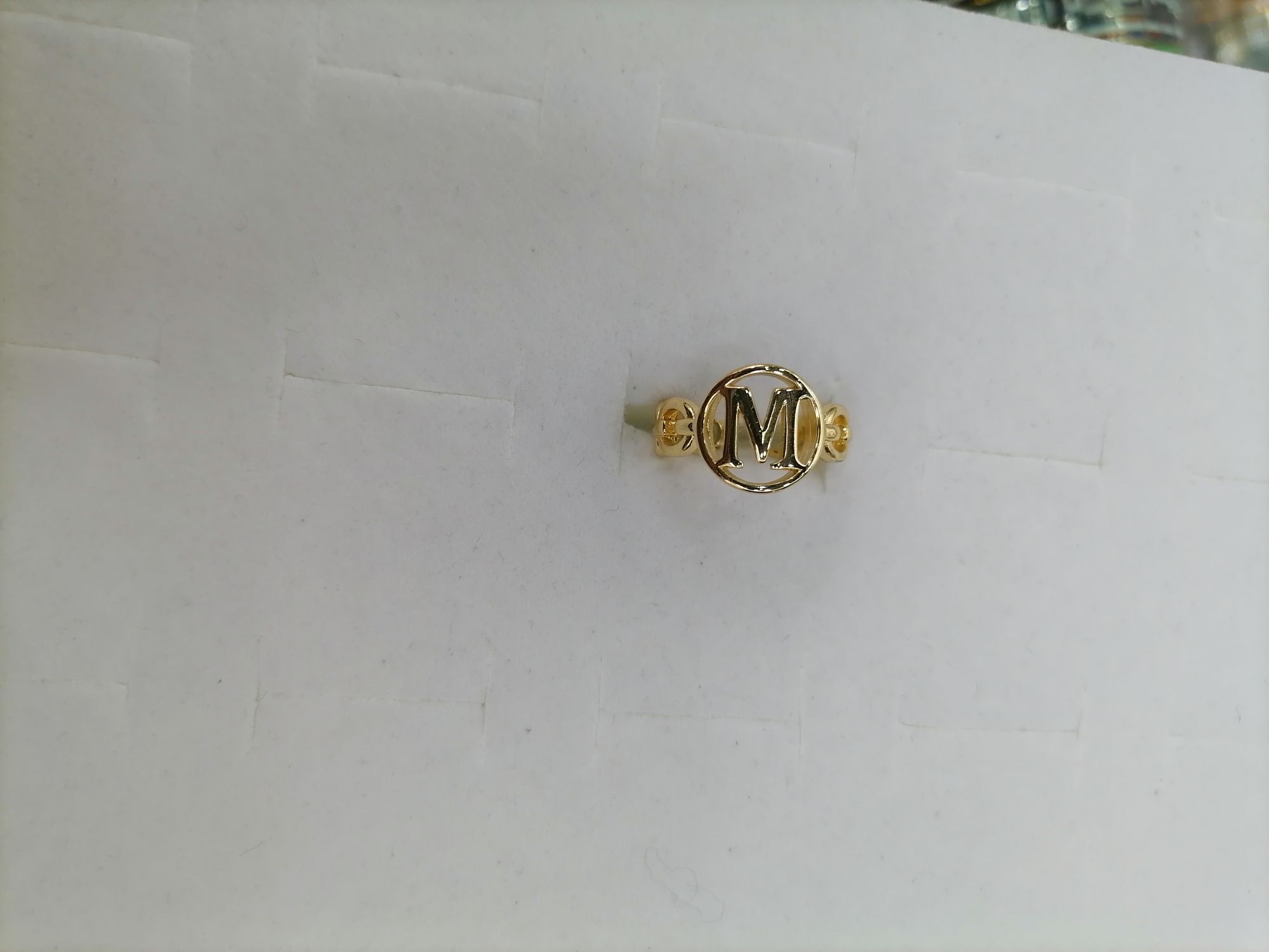 Titanium steel gold hollow M circle bar ring