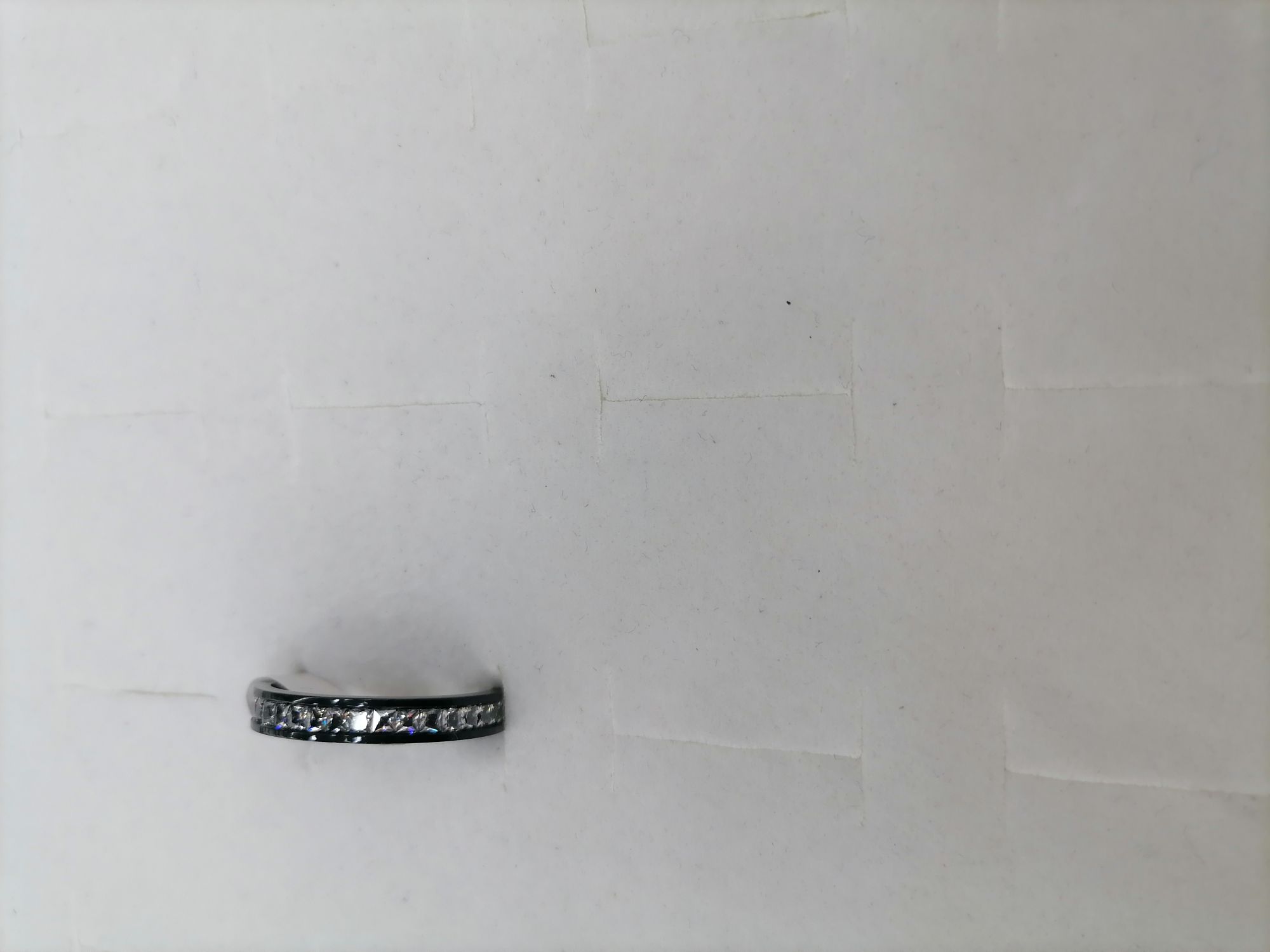 Titanium steel black outside a row of diamond rings