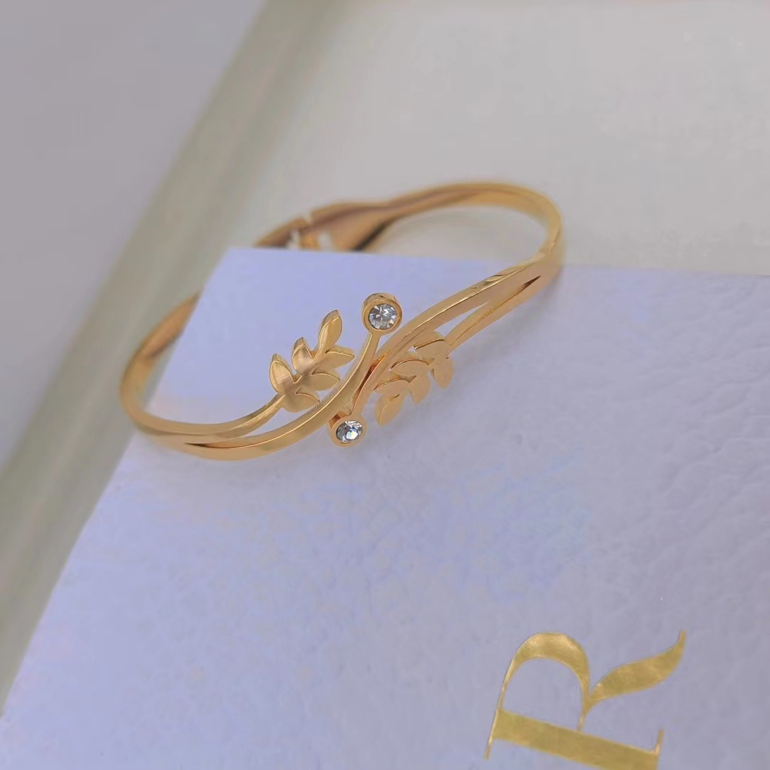 This bracelet exudes a light luxury and high-end vibe. It is made of titanium steel, a niche product that does not fade, and features an exquisite, ins fashion design. The gold bracelet is simple and elegant for girls detail image 4