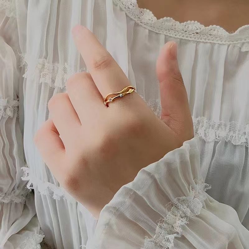 A niche and fashionable multi-layer layered ring for women, adjustable rose gold, personalized design, index finger ring joint accessory Item Picture