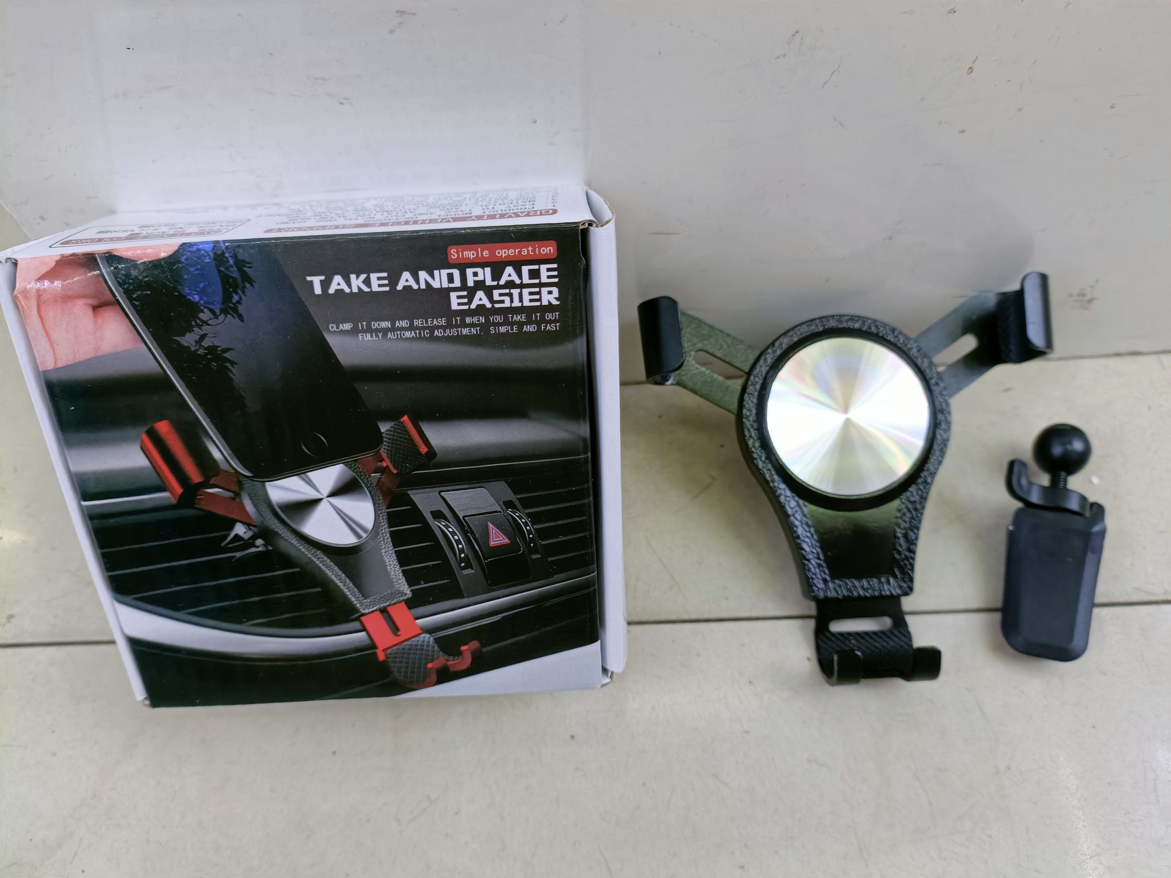 Air outlet gravity phone mount