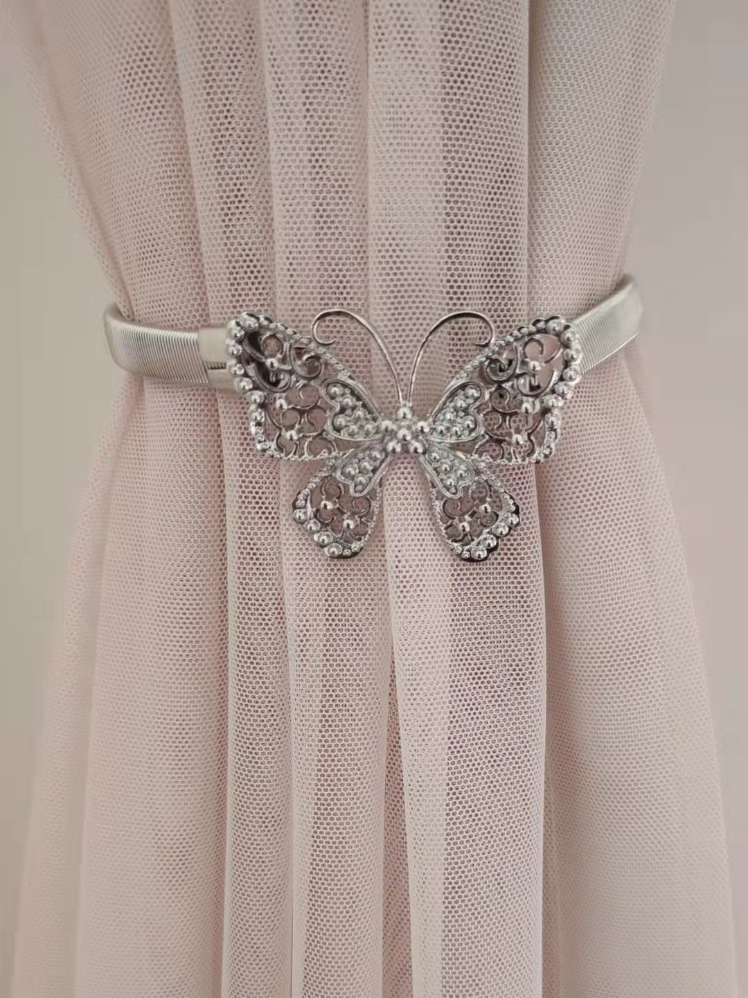 Factory direct sales of modern no-hole series curtain accessories without installation of spring buckle art curtain buckle details Picture