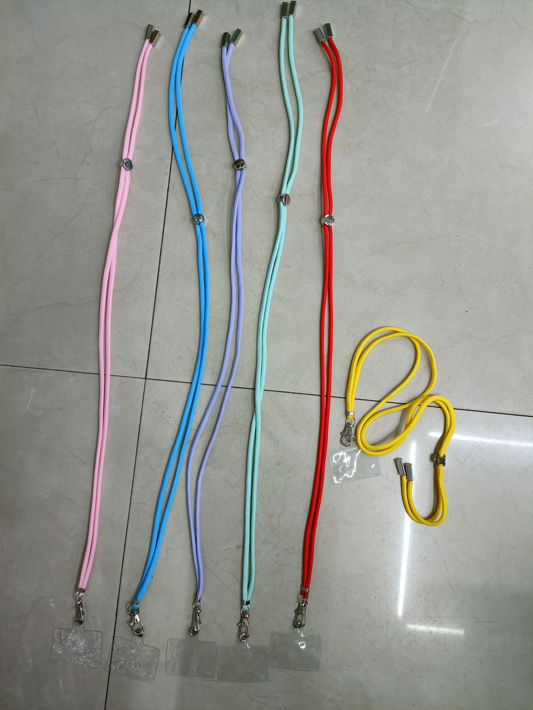 Mobile phone lanyard + transparent film color rope with holes