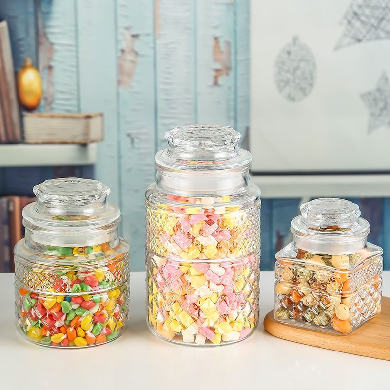 Vintage embossed glass sealed jar of dried fruit, tea and coffee beans storage jar