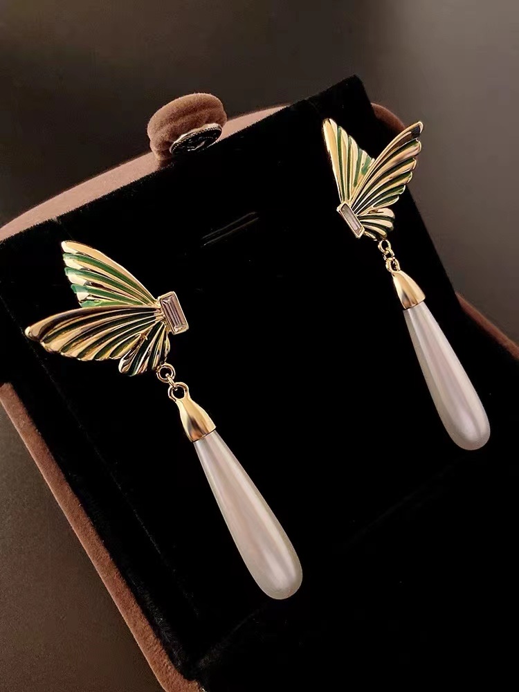 Butterfly pearl earring Silver needle allergy-resistant colored Ni jewelry Model 161