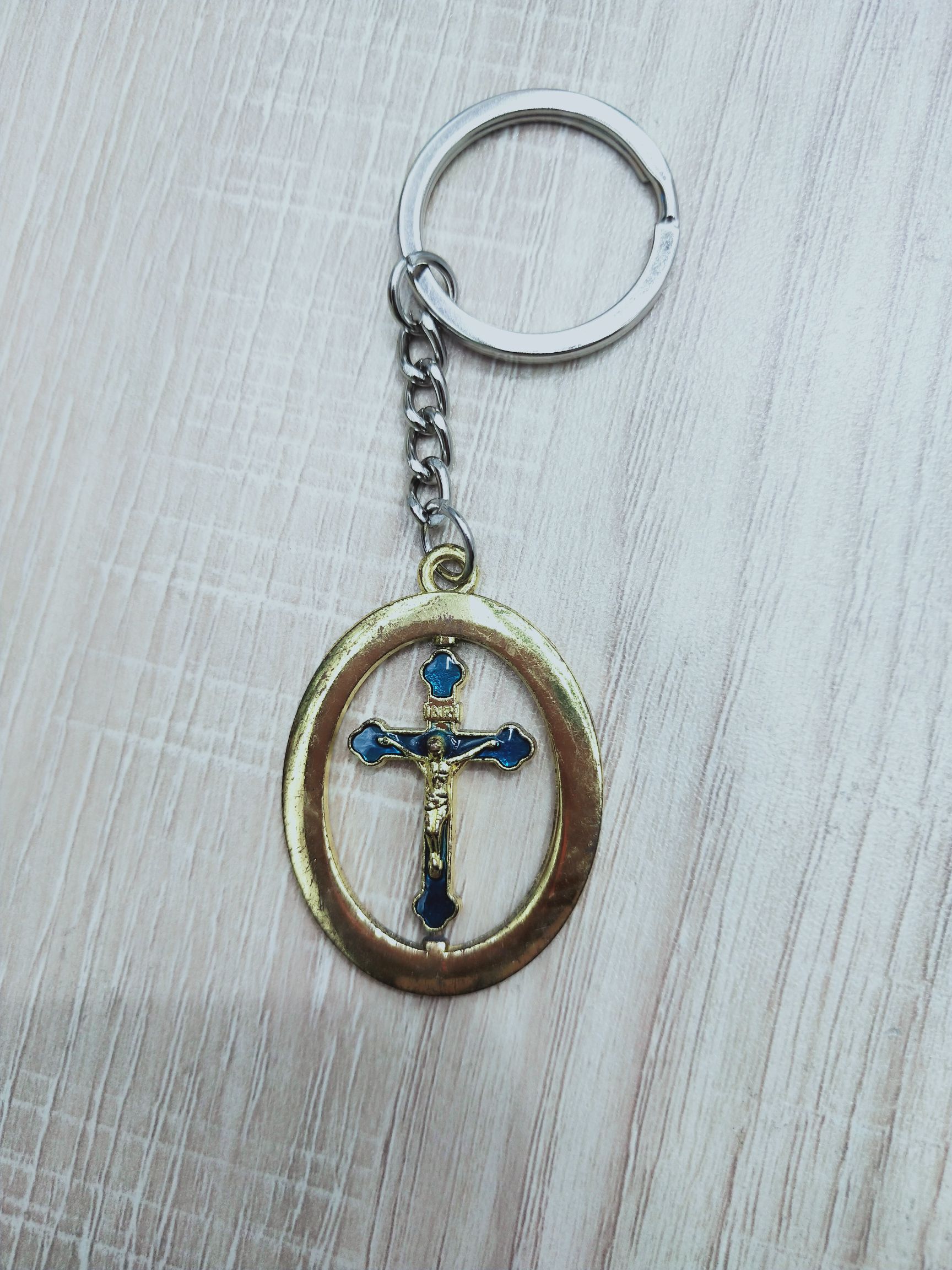 Alloy cross rotating pendant key chain, manufacturers direct sales of various religious articles, best-selling foreign markets