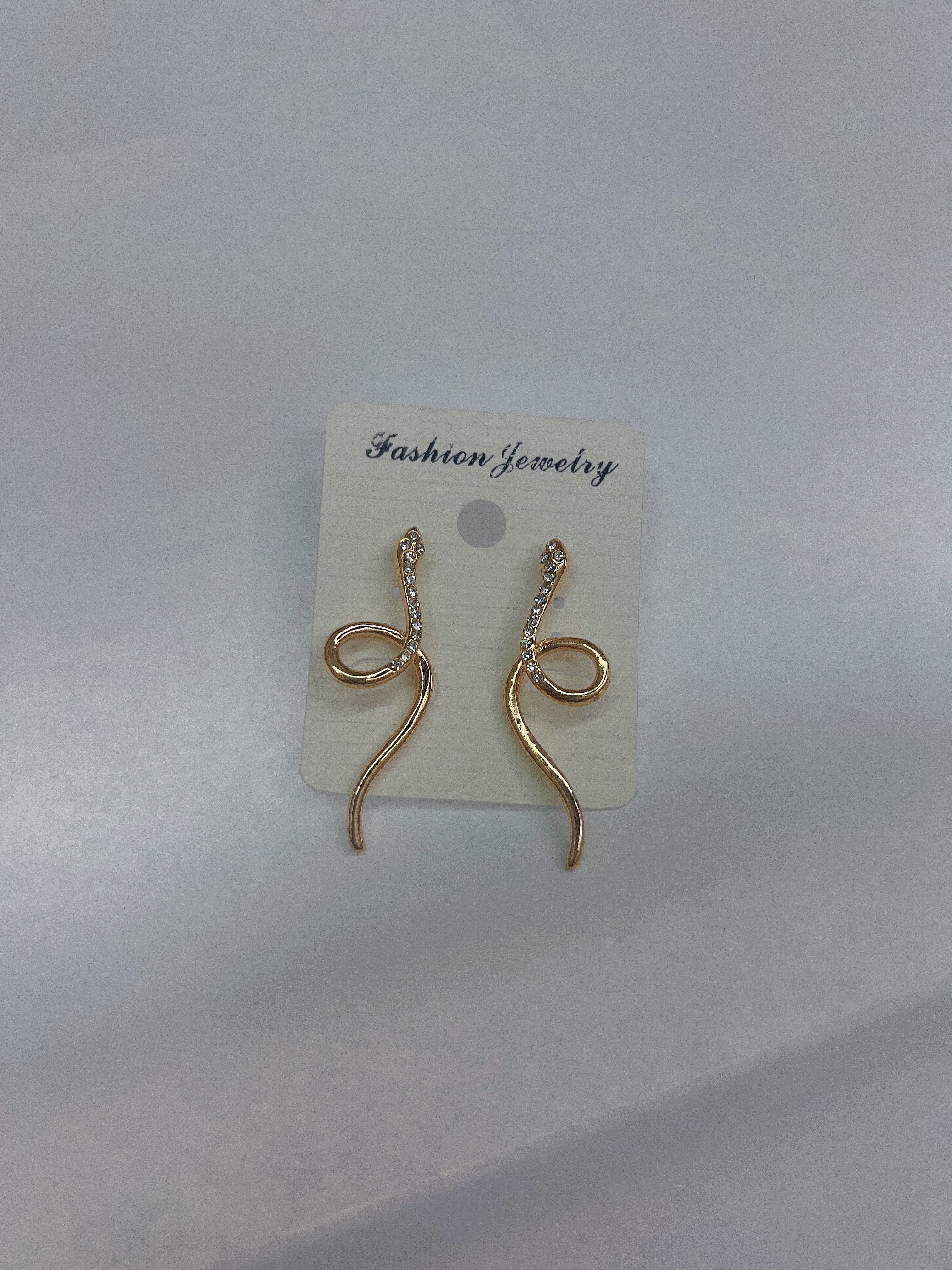 Metal snake-like rhinestone earrings compact compact European and American fashion jewelry 063