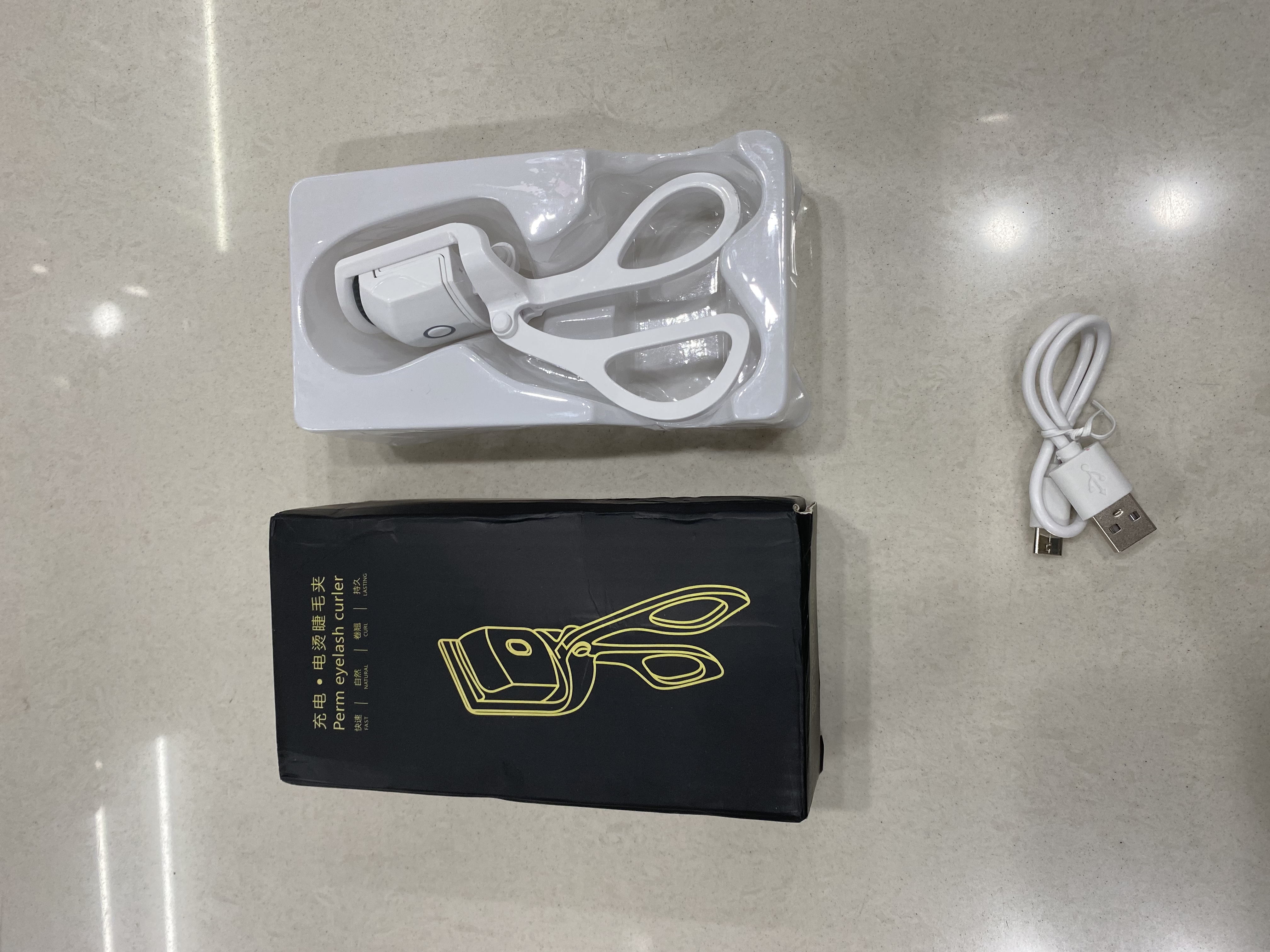 Electric eyelash curler