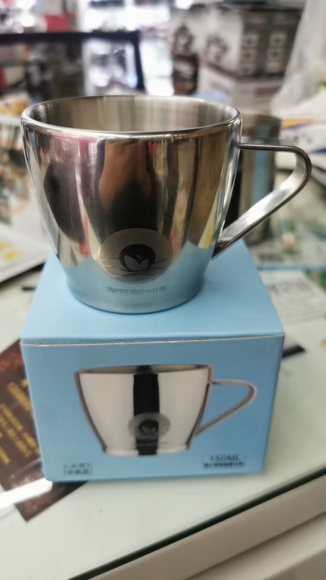 Double stainless steel mug, available from stock thumbnail