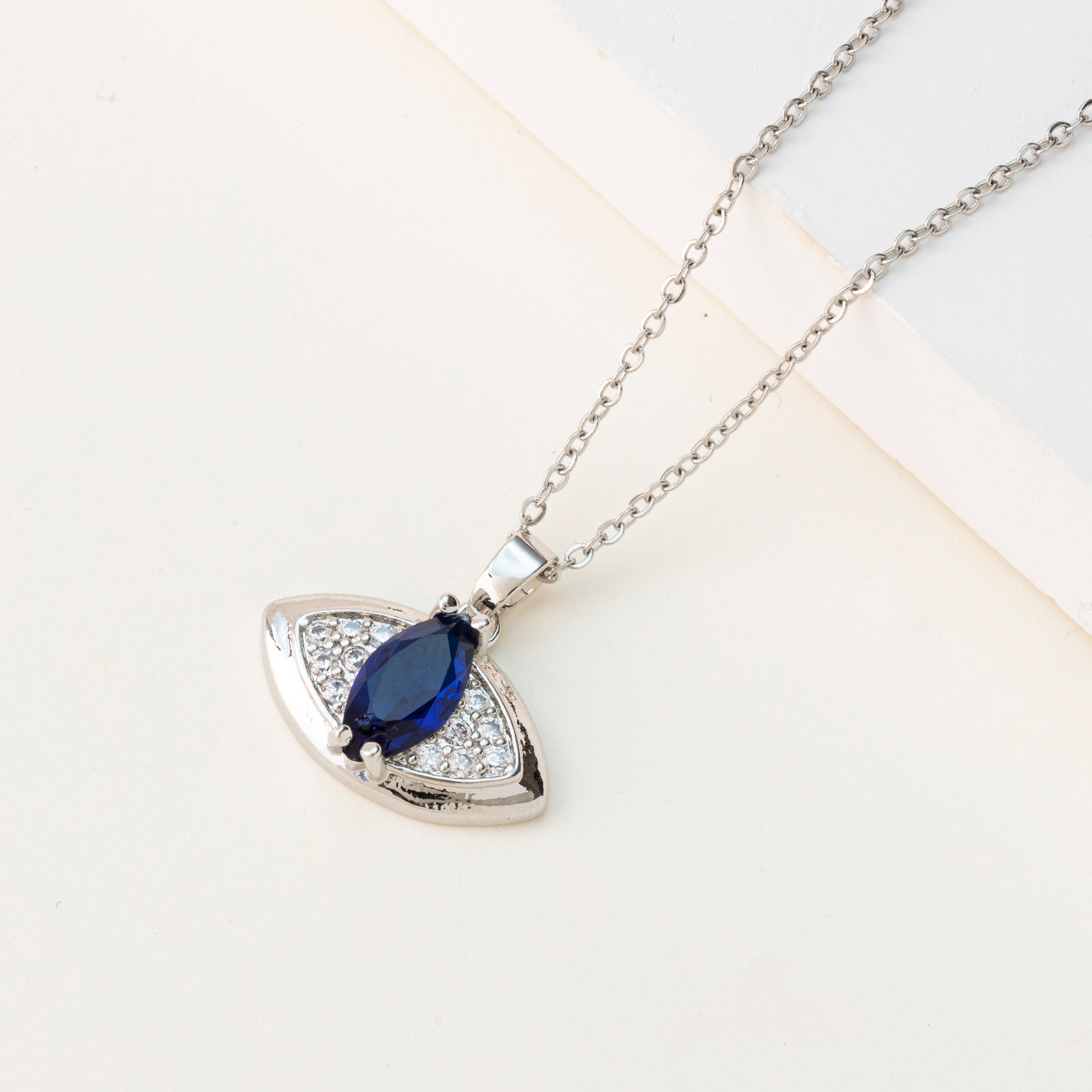Europe And The United States Cross-Border Sales Of Evil Eyes Pendant Necklace Titanium Steel Collarbone Chain Copper Plated 18-Karat Gold Fashion Sweater Chain Application Scenario