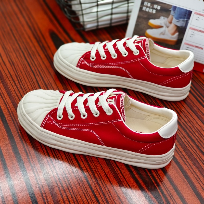 Human canvas shoes light soft elastic breathable red board shoes student casual shoes dissolve shoes