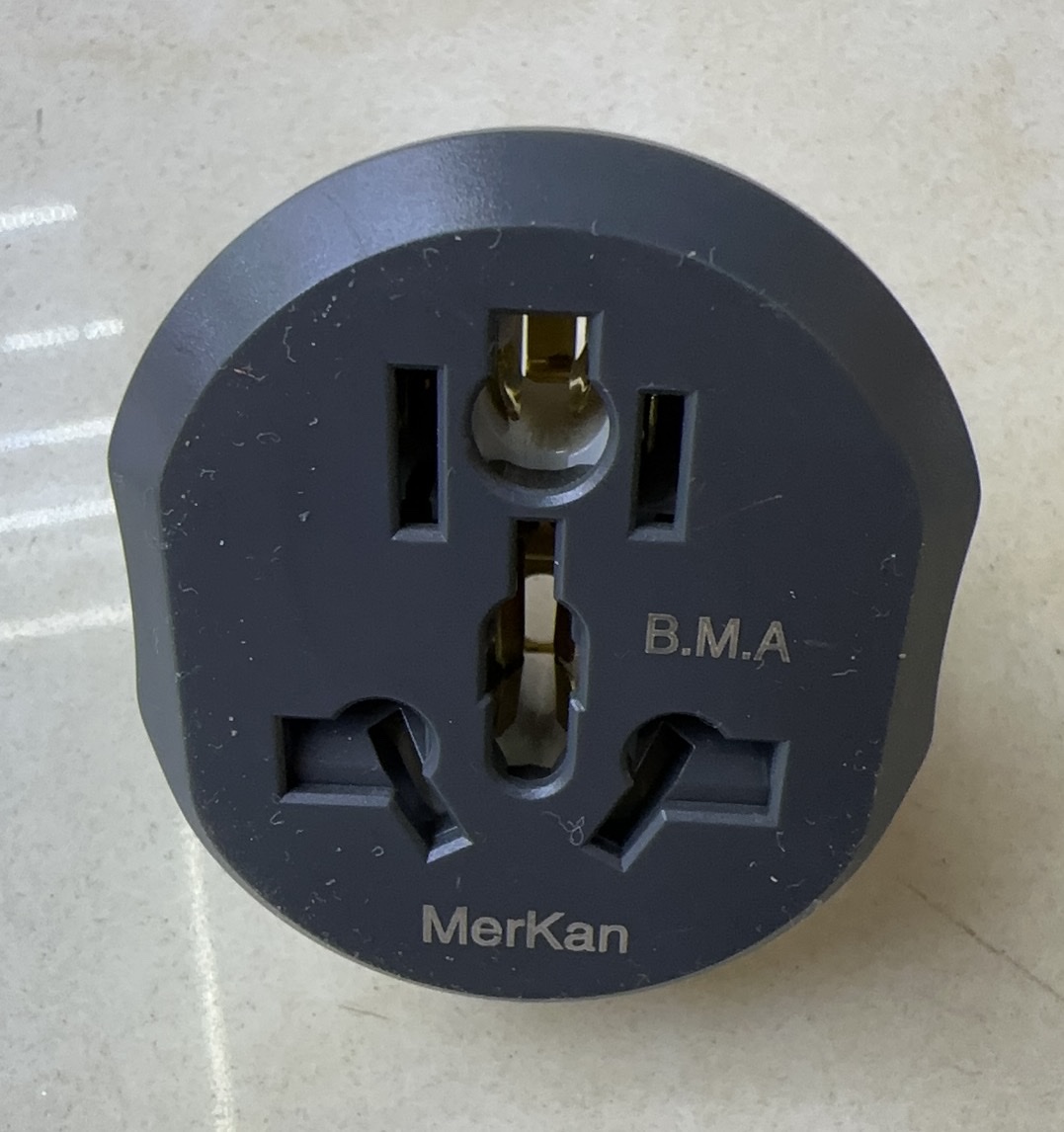 Modern electrical plugs and sockets on a white background