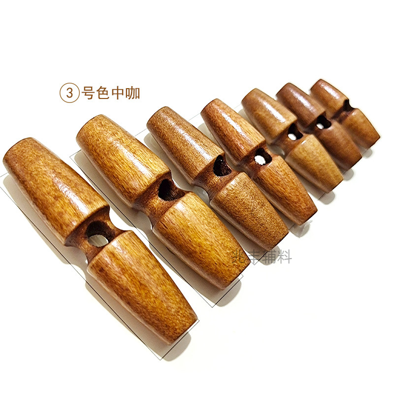Wholesale of wooden olive QQ nuts, black single-hole wooden button buttons for coats and windbreakers, decorative adjustment buttons details Picture
