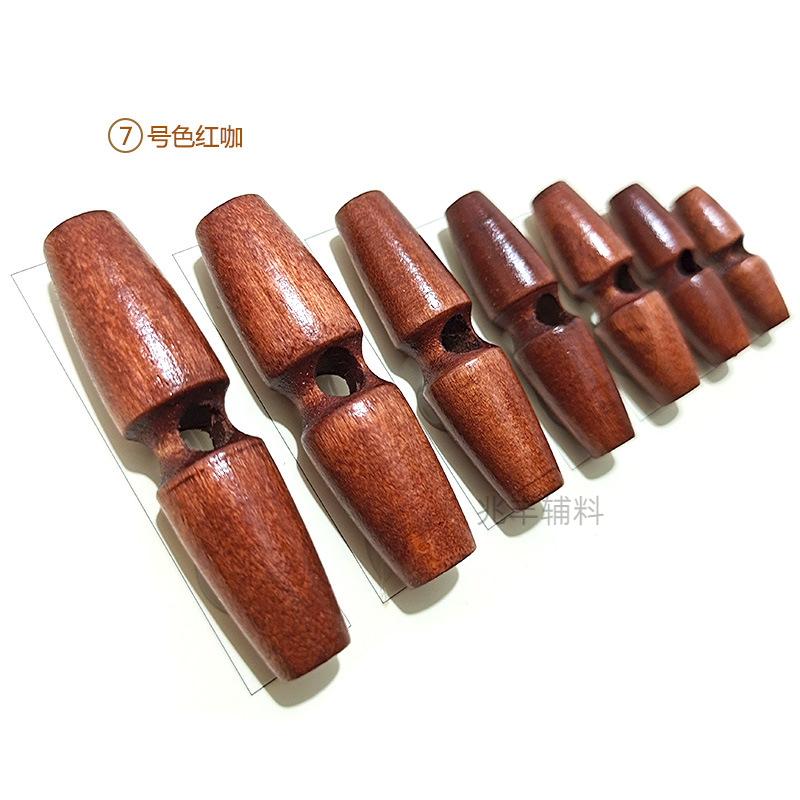 Wholesale of wooden olive QQ nuts, black single-hole wooden button buttons for coats and windbreakers, decorative adjustment buttons Item Picture