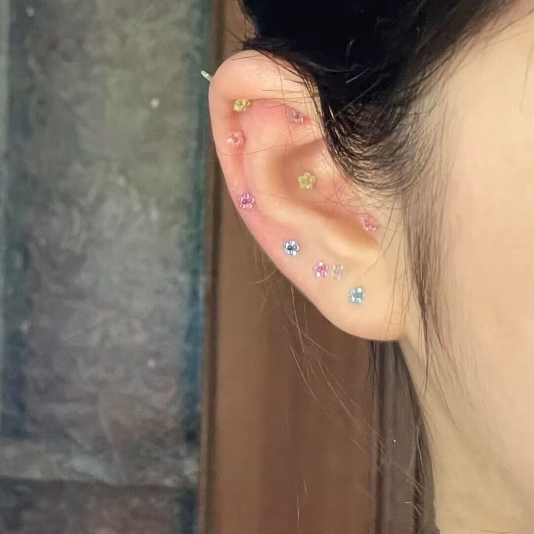 Plastic small flower ear sticks, shaped ear sticks, plum blossom ear studs details Picture