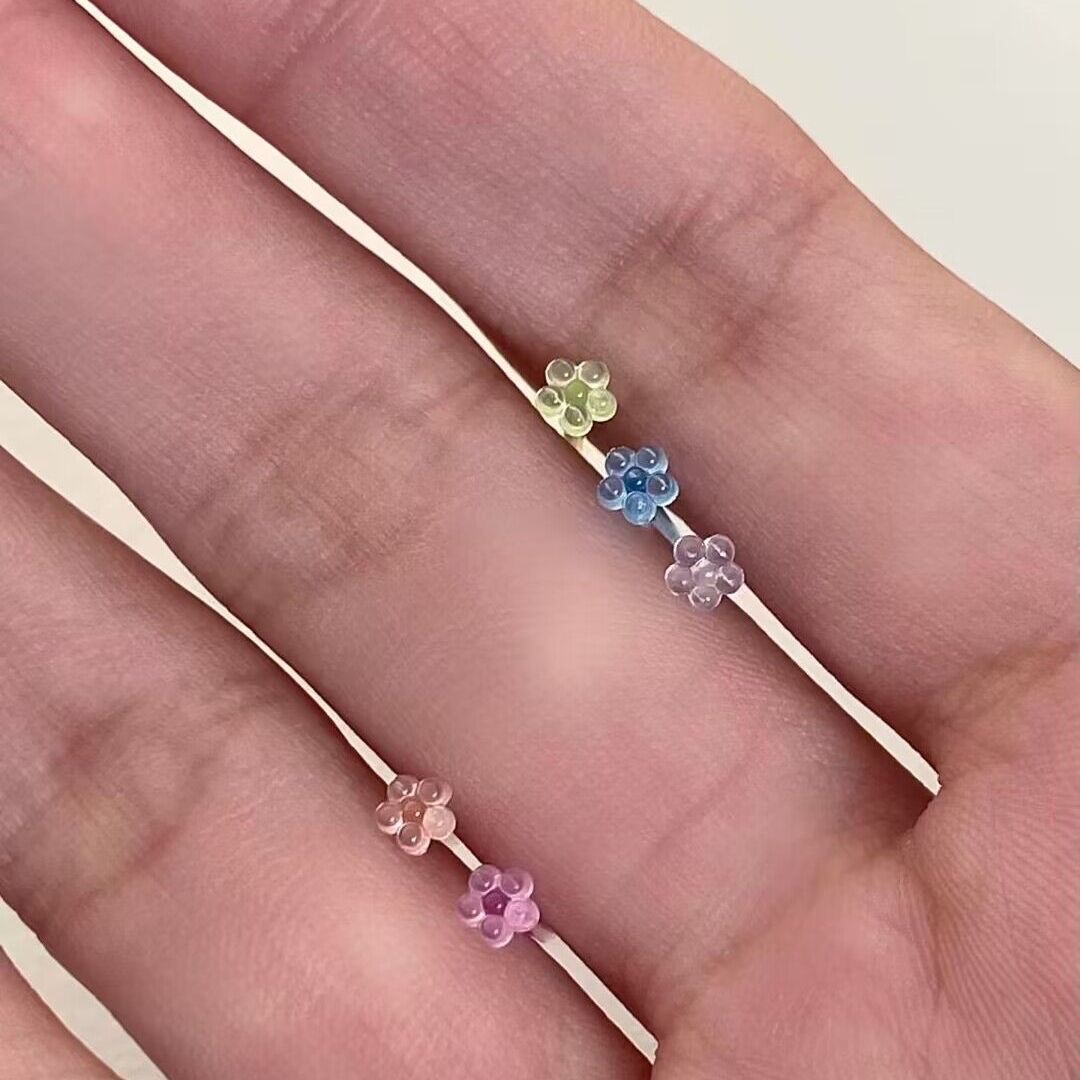 Plastic small flower ear sticks, shaped ear sticks, plum blossom ear studs Application Scenario