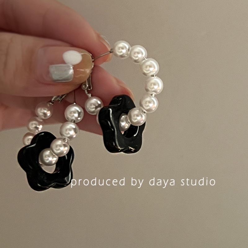 Pearl ear rings with black acrylic small flowers, paired with two pairs of earrings Specification image