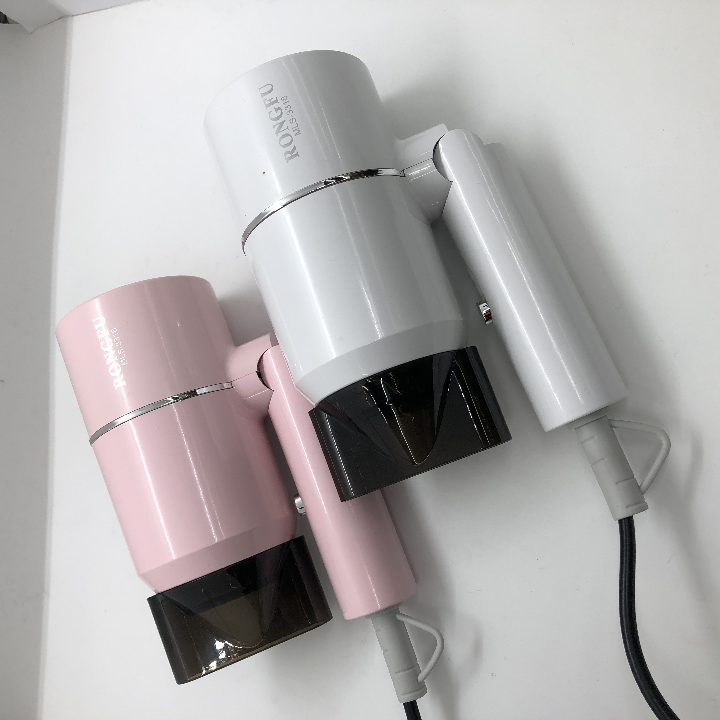 New models of folding hair dryers in pink and white for export as gifts Item Picture