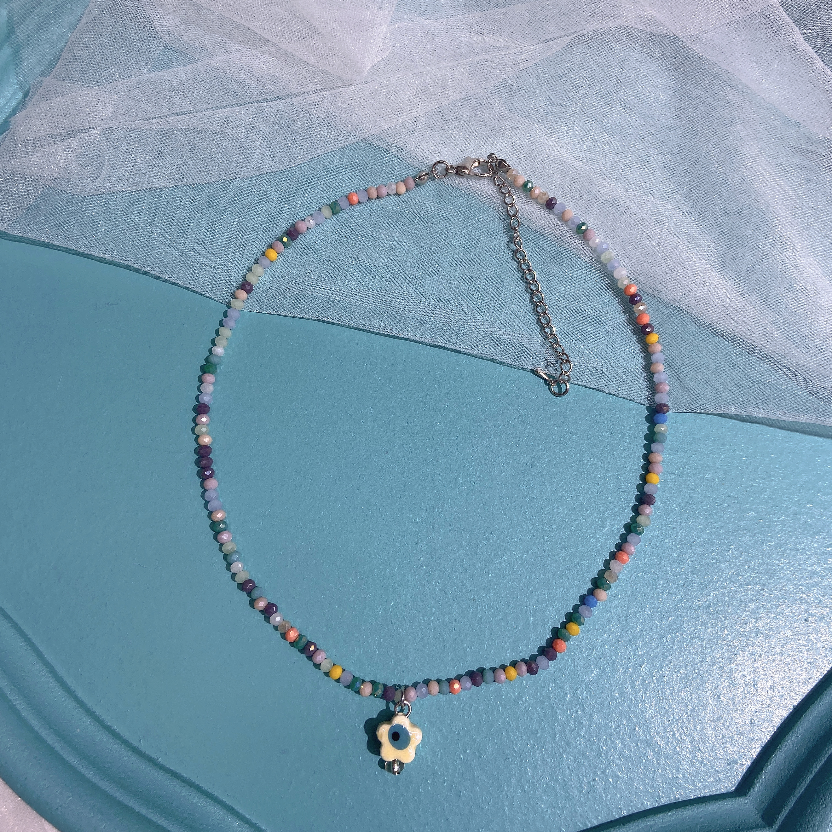 Hand-woven rice bead necklace with smiling face ceramic Application Scenario