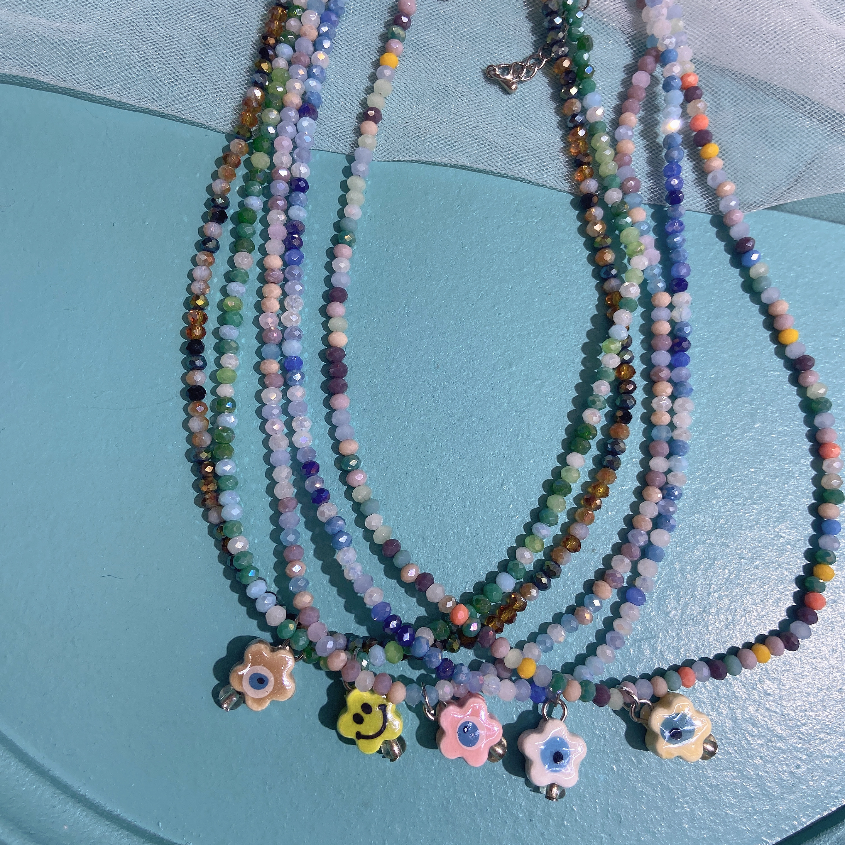 Hand-woven rice bead necklace with smiling face ceramic Item Picture