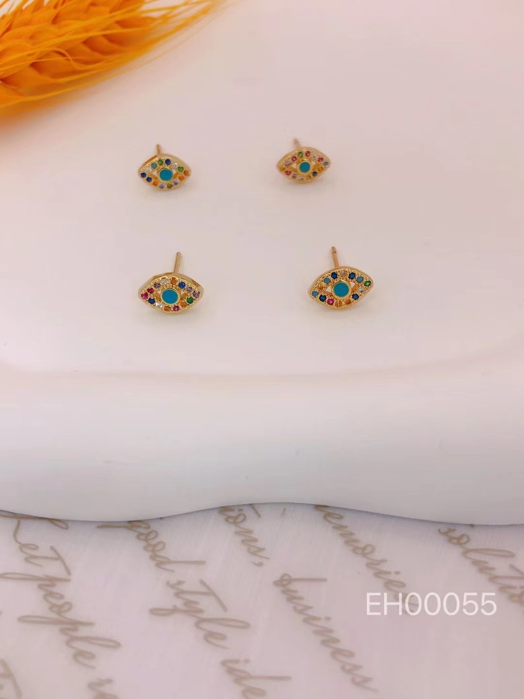 Cross border jewelry eyes zircon inset earrings copper gold plated jewelry