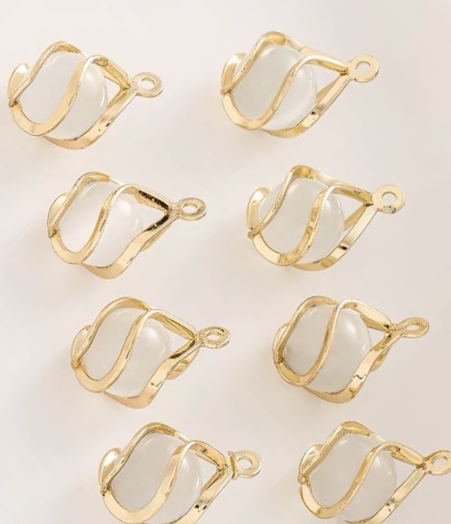diy accessory, handcrafted bracelet, necklace and decorative pendant with a dynamic cat's eye stone bead around the cage Specification image