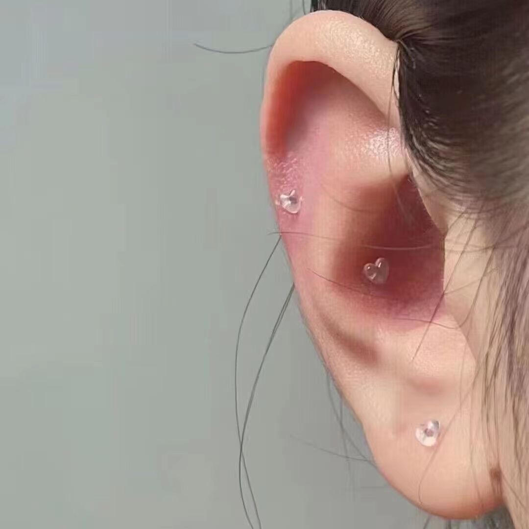Anti-allergy, transparent heart-shaped plastic ear studs, invisible ear sticks, nourishing ear holes, no need to remove ear bone studs for women when sleeping Application Scenario