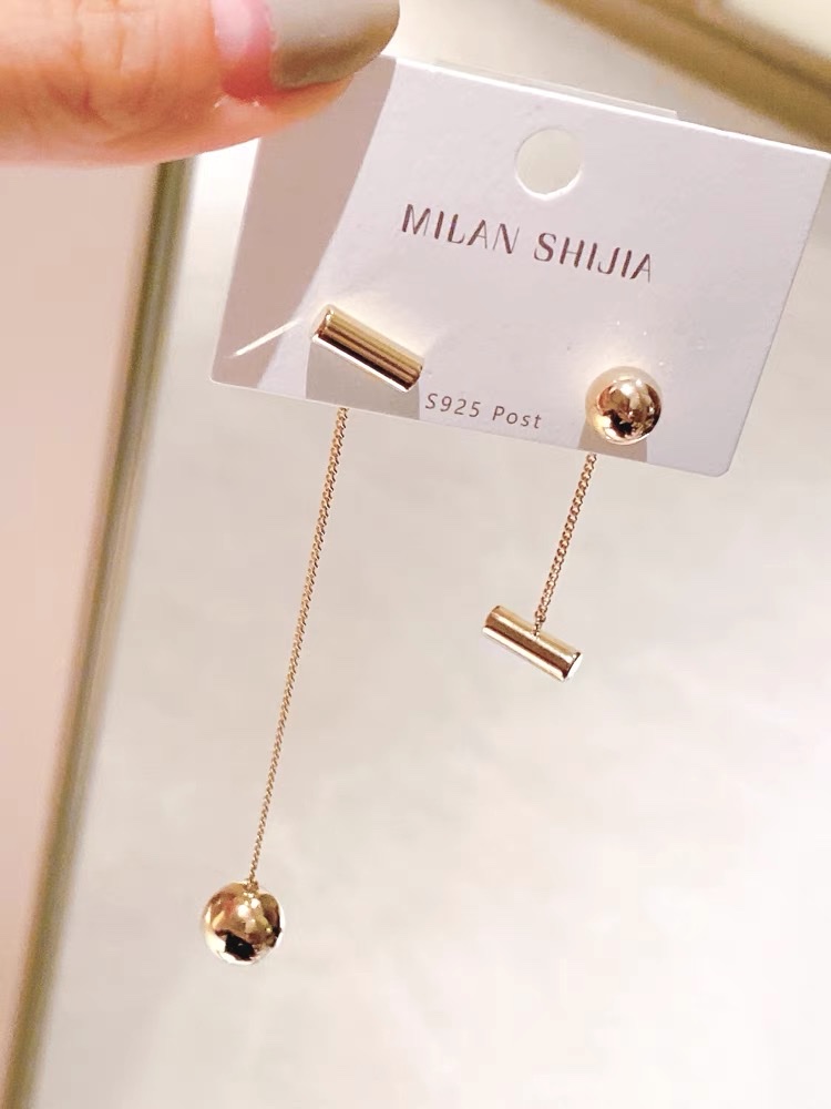 Milanciaga's high-end geometric round asymmetrical earrings, long metallic earrings for women, and a cold new style