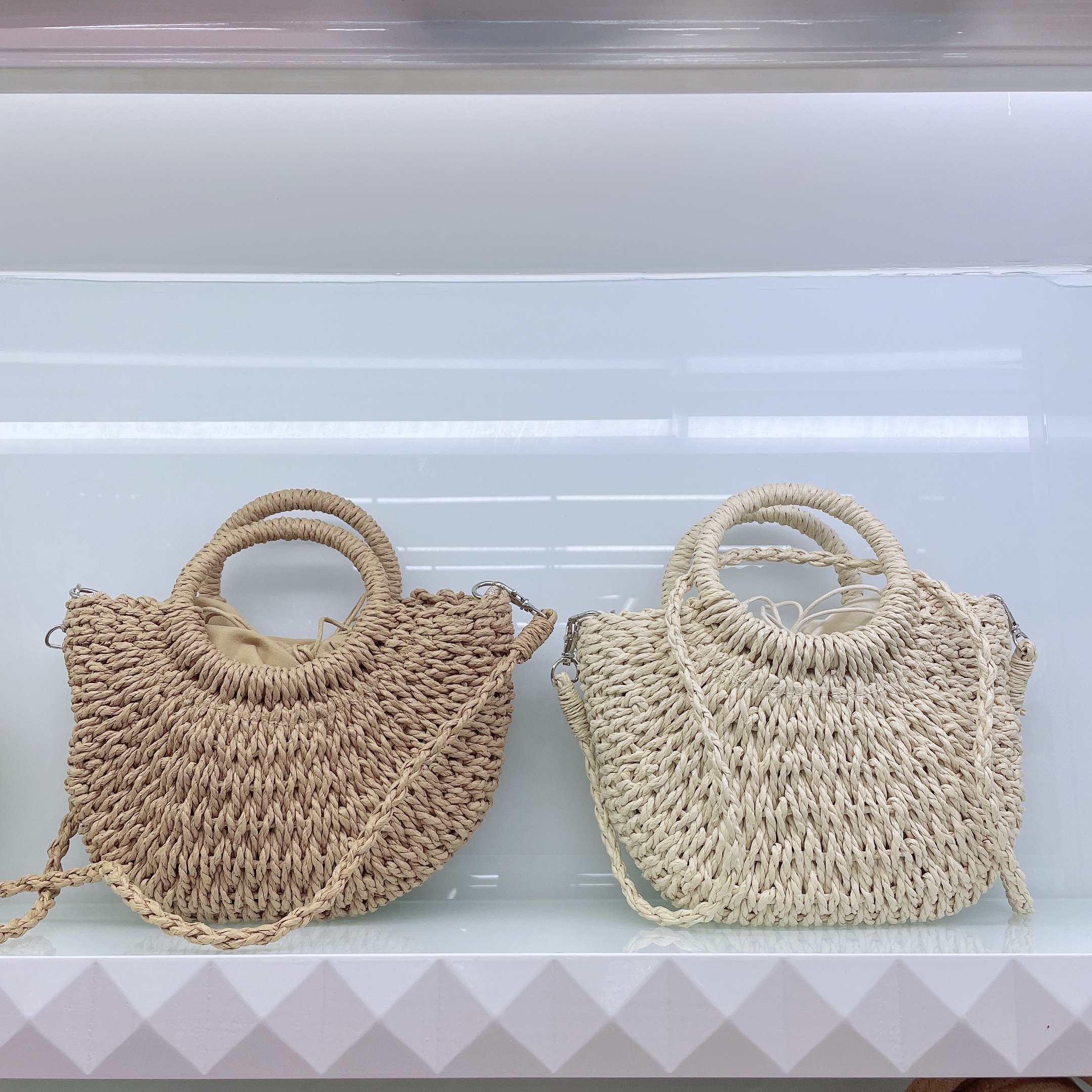 Paper rope woven bags, women's crossbody straw woven bags, small round bucket handbags, hand-woven straw woven bags, hollowed-out hand-woven bags, wholesale, customizable woven bags, straw woven bags, Lafite straw woven bags, women's straw woven bags, artistic straw woven bags