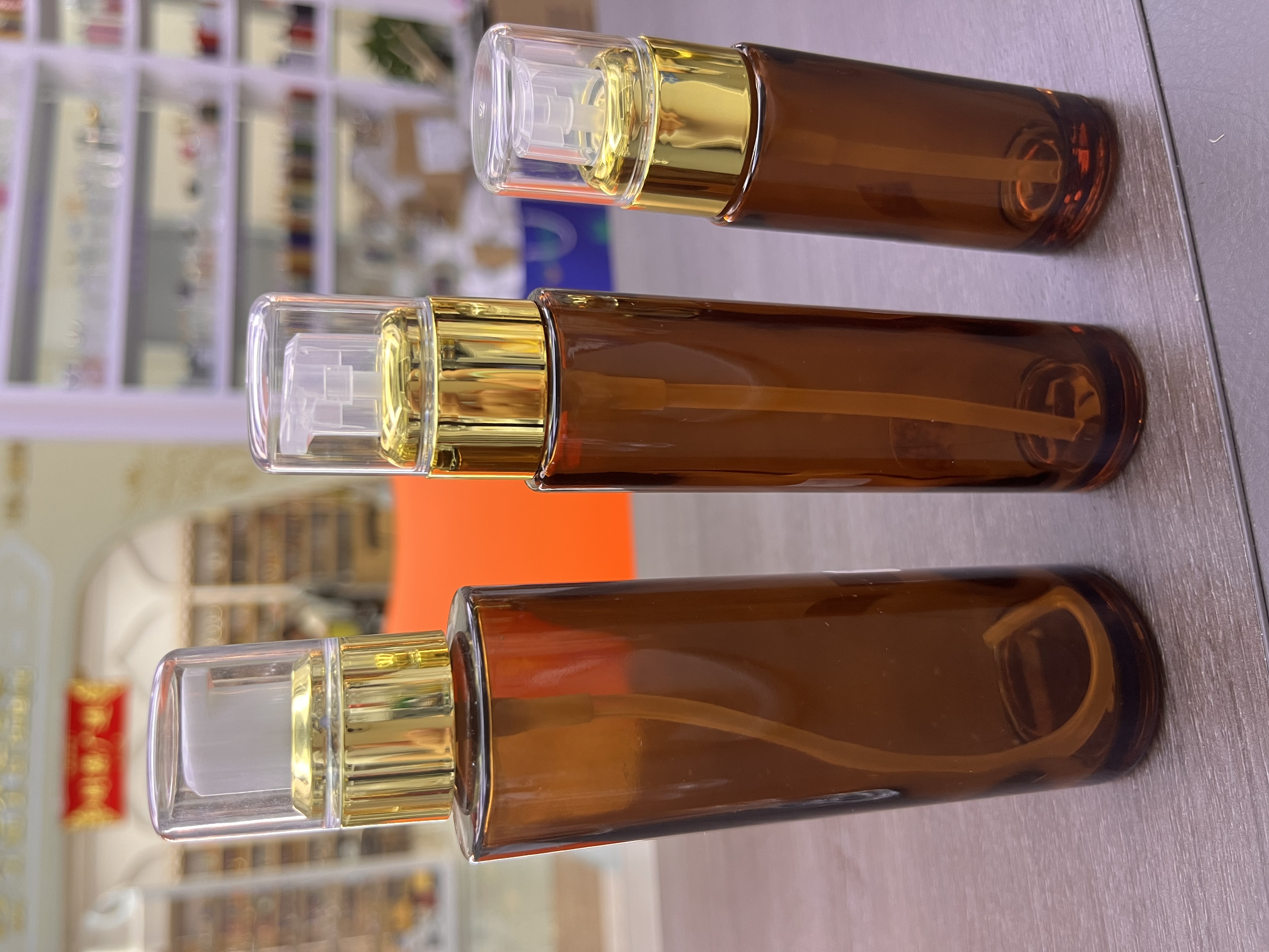 Houde Glass Factory offers straight round bottles, coffee-colored lotion bottles, high-end cosmetic bottles and glass bottles details Picture