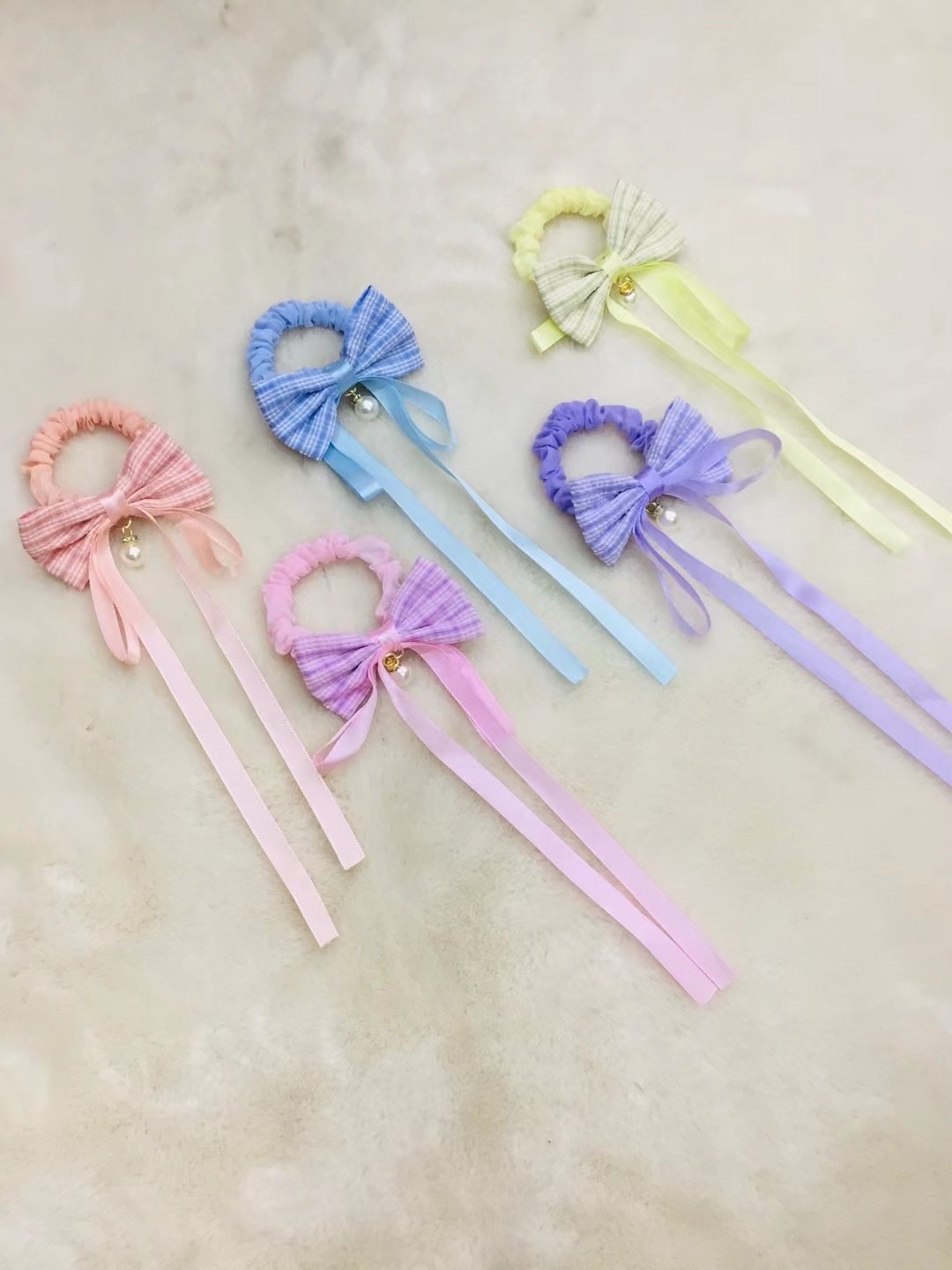 Bow tie pearl hair tie thumbnail