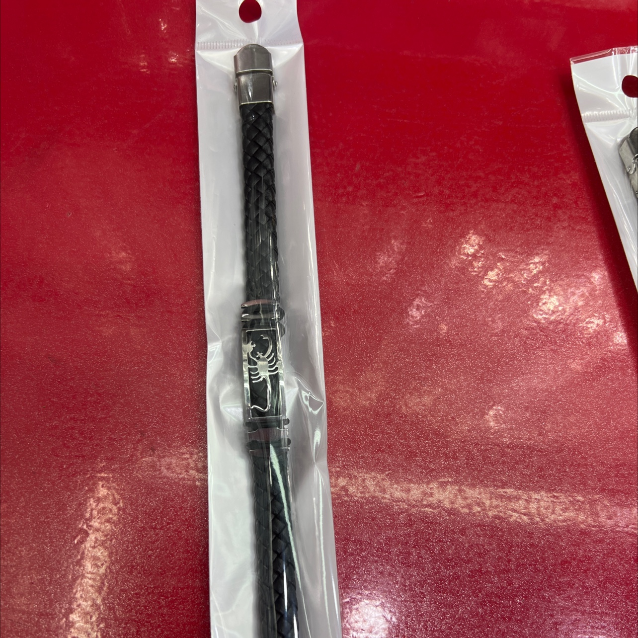 时尚编织P U切割蝎子图案套硅胶小皮圈不绣钢皮手链