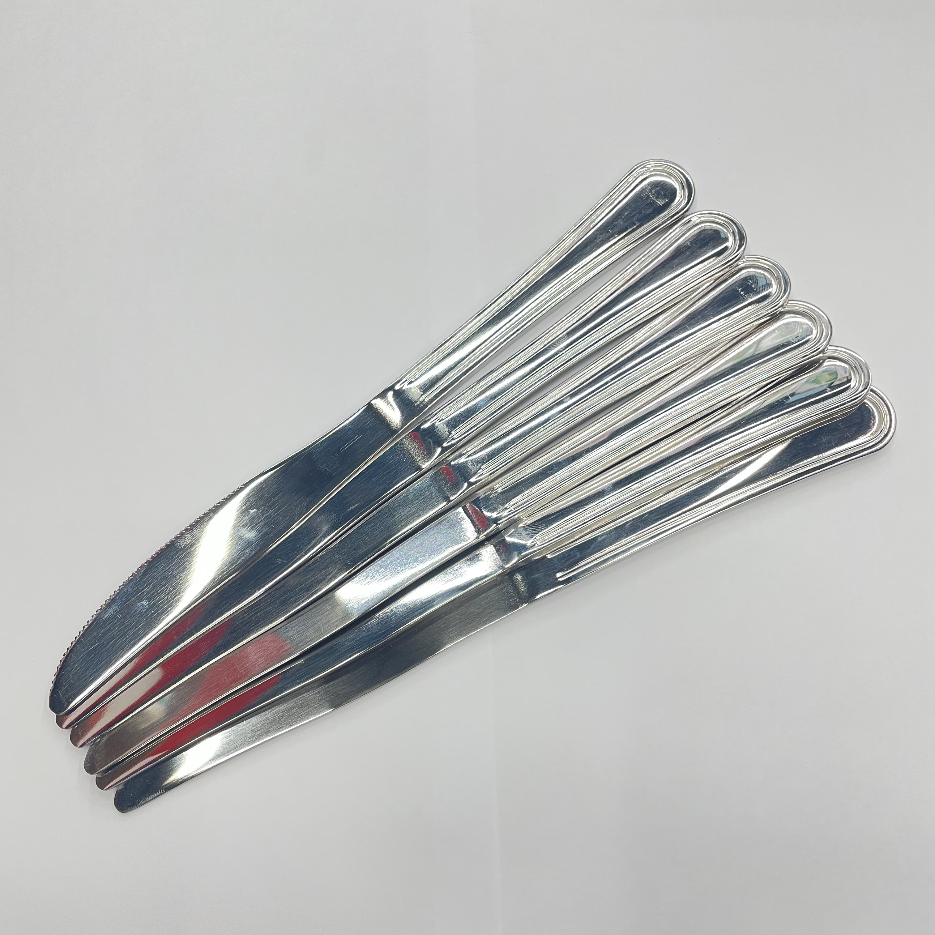 Cutlery set inside modern kitchen drawer showing compact storage