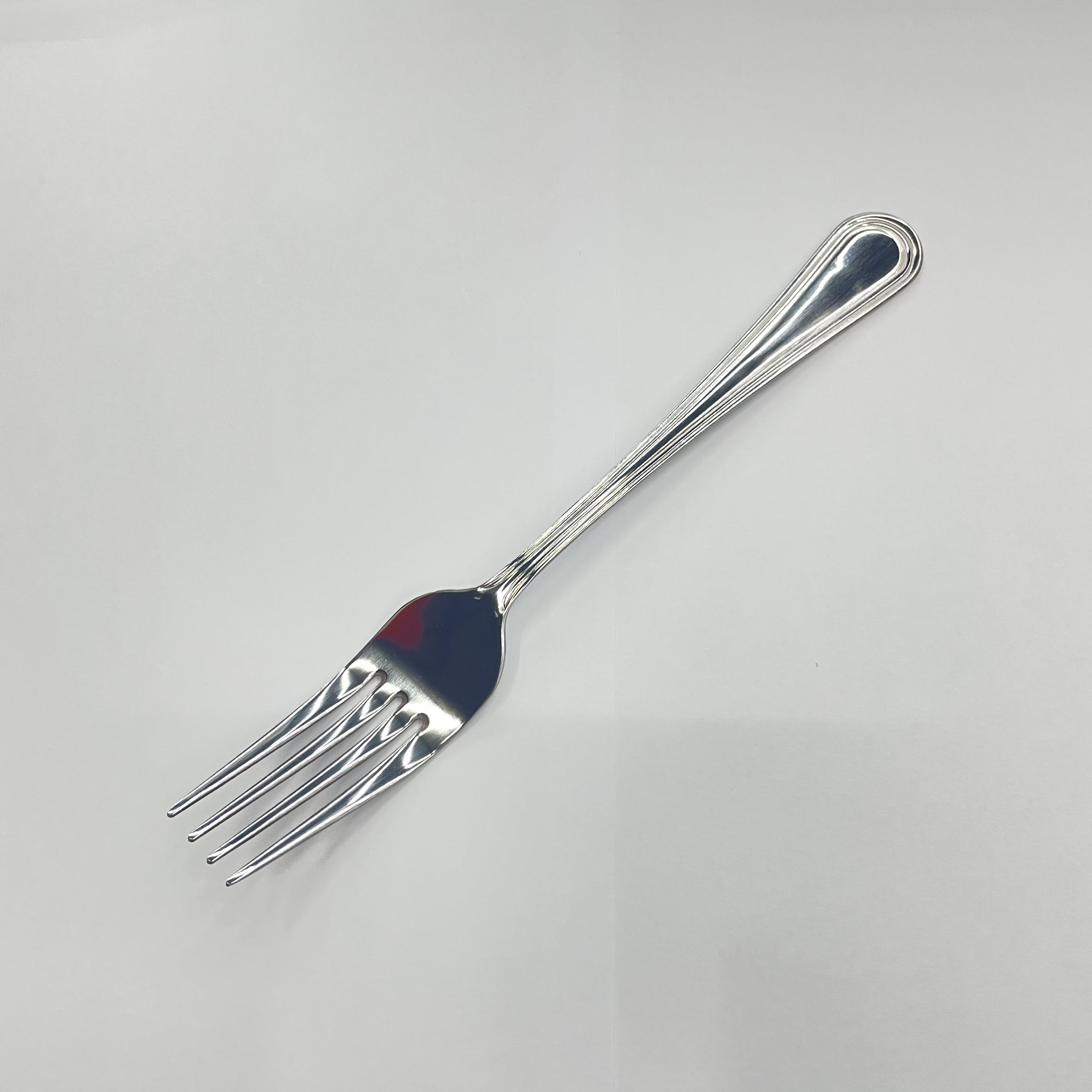 Cutlery set displayed in modern kitchen setting