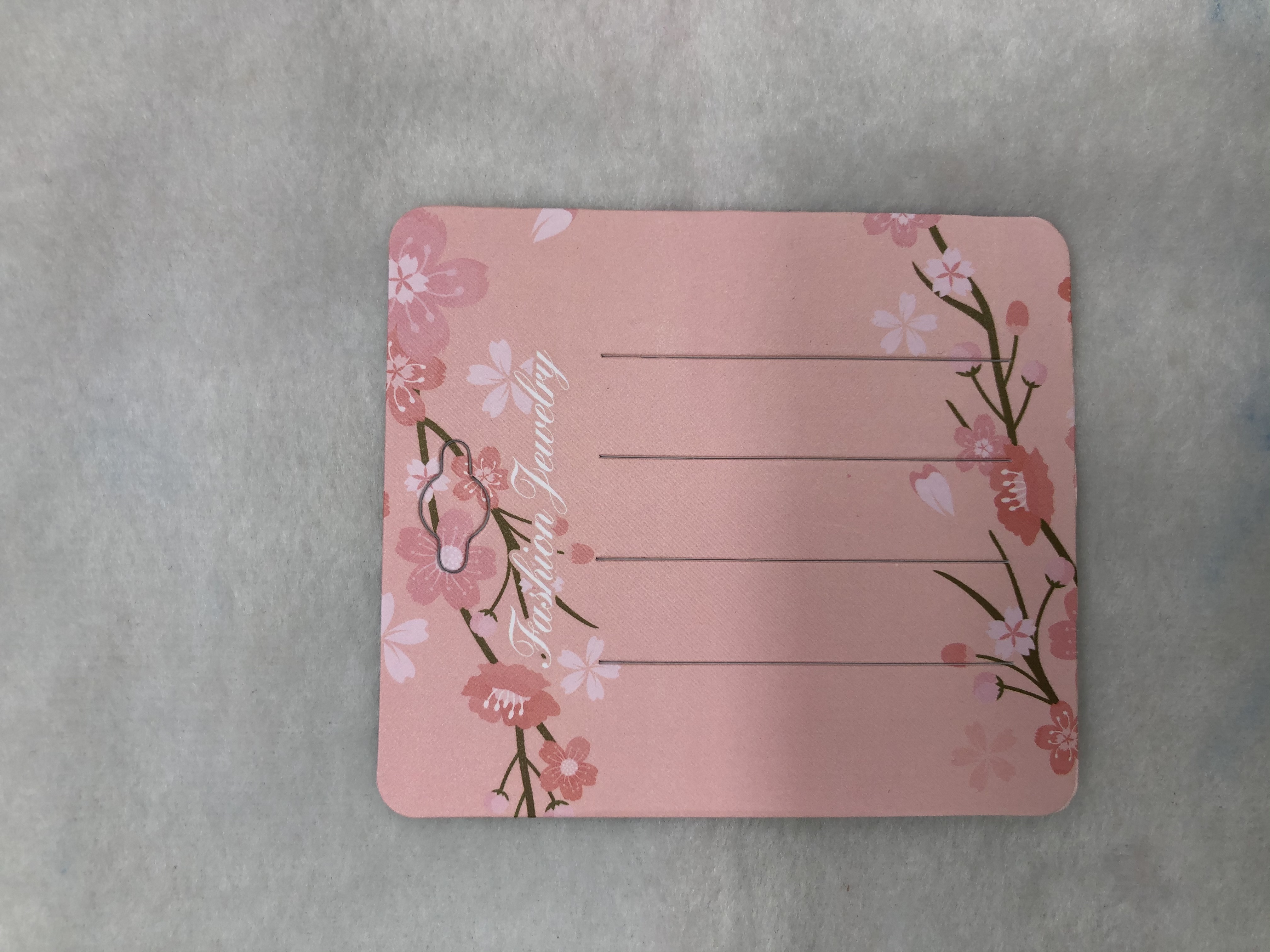 7.5*8.7发夹卡彩色印刷900克白卡正面腹哑膜反面空白飞机孔圆角