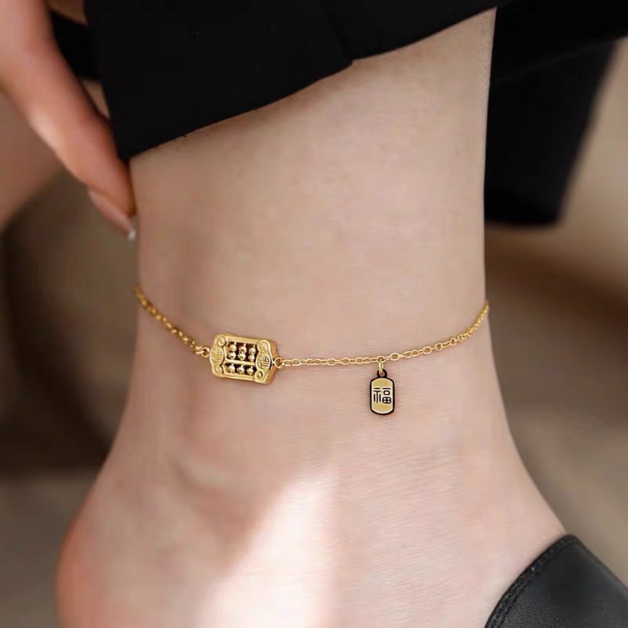 New gold titanium steel abacus Fu brand plated 18K gold anklet female summer does not fade small light luxury foot chain full figure