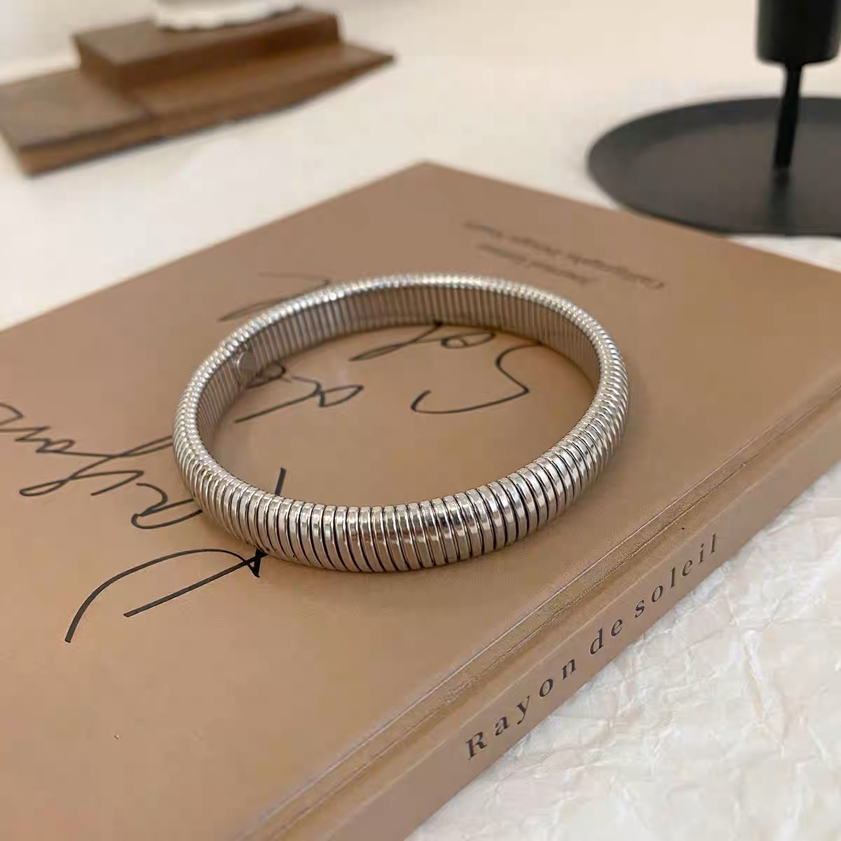 European and American thread metal elastic snake bone wide bracelet female light luxury niche exaggerated silver folded wear bracelet details Picture