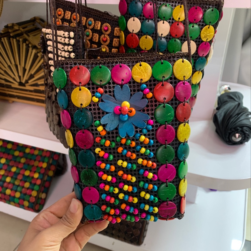 We offer a wide range of handcrafted coconut shell bags in stock and are a manufacturer of beaded bags