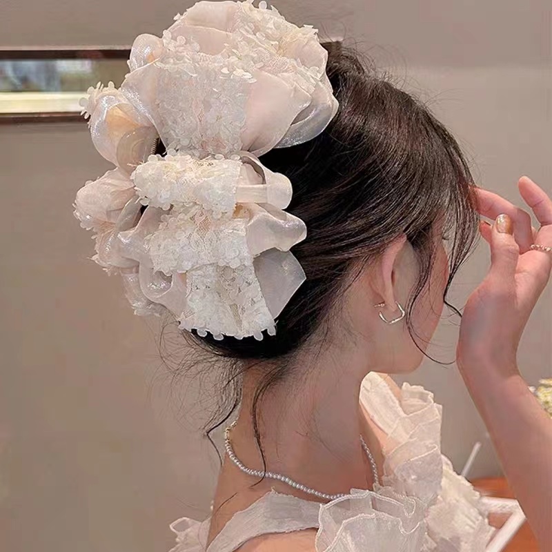 Summer lace-trimmed large multi-layer bow clip hair accessory, hair clip for women, high-end look, shark clip at the back of the head Application Scenario