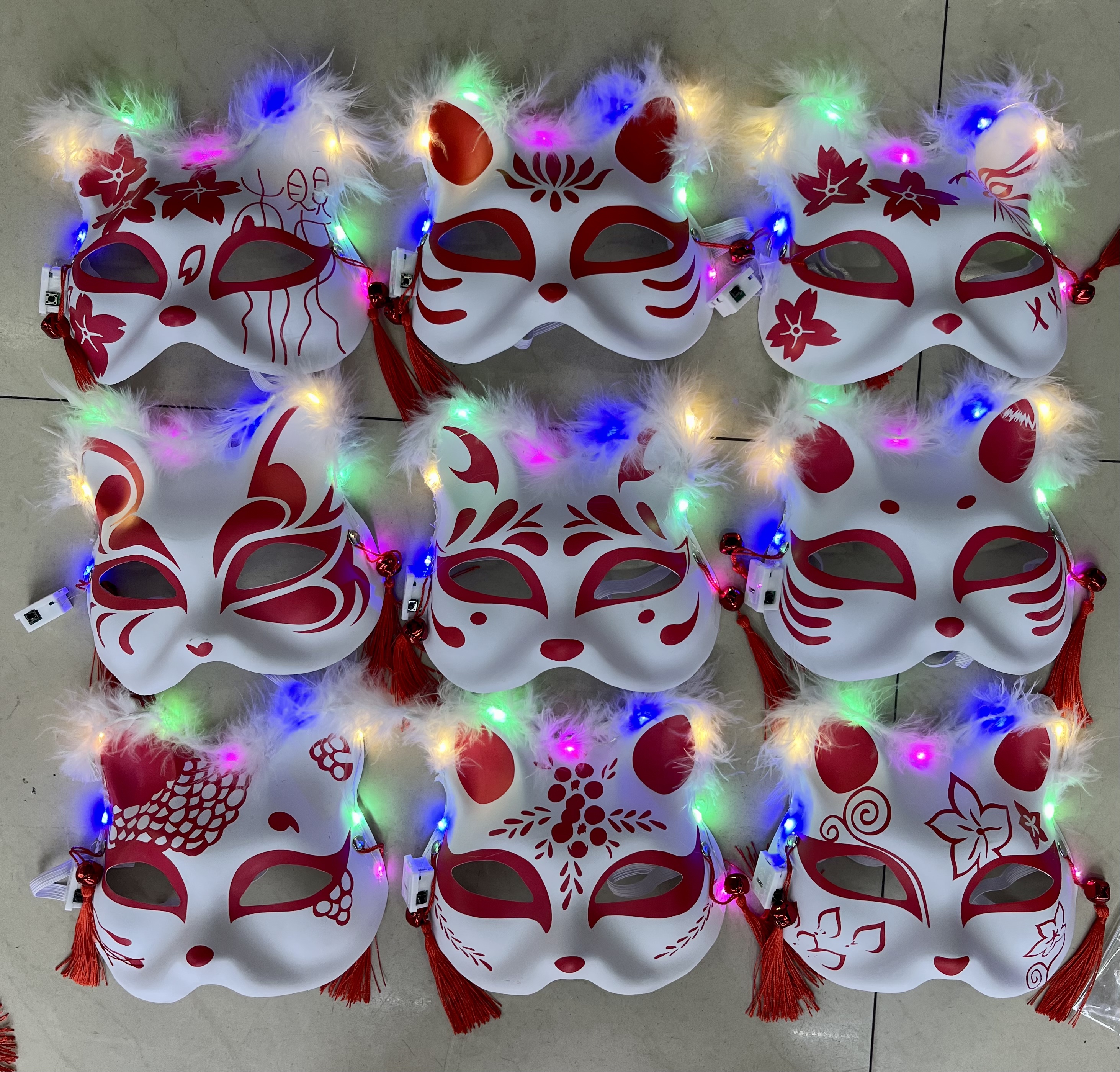 A cat, a fox, a lamp, a mask with fur