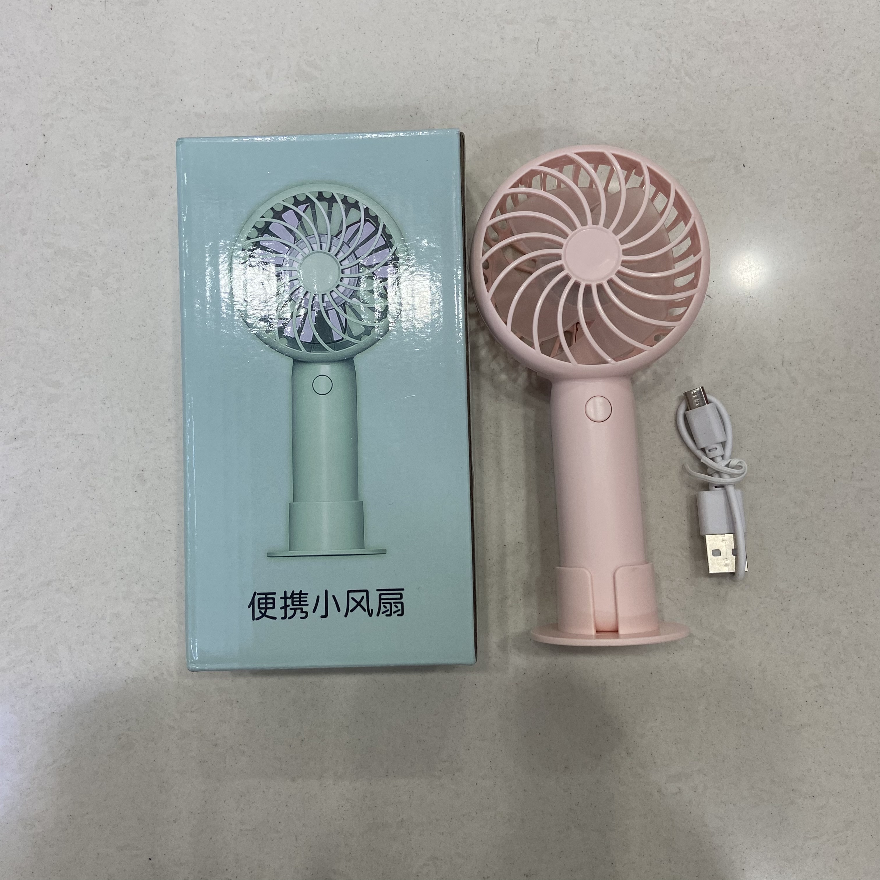 Mini handheld electric fan, portable, easy to carry and rechargeable