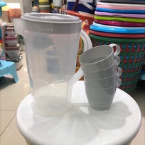 The water bottle has four small cups inside