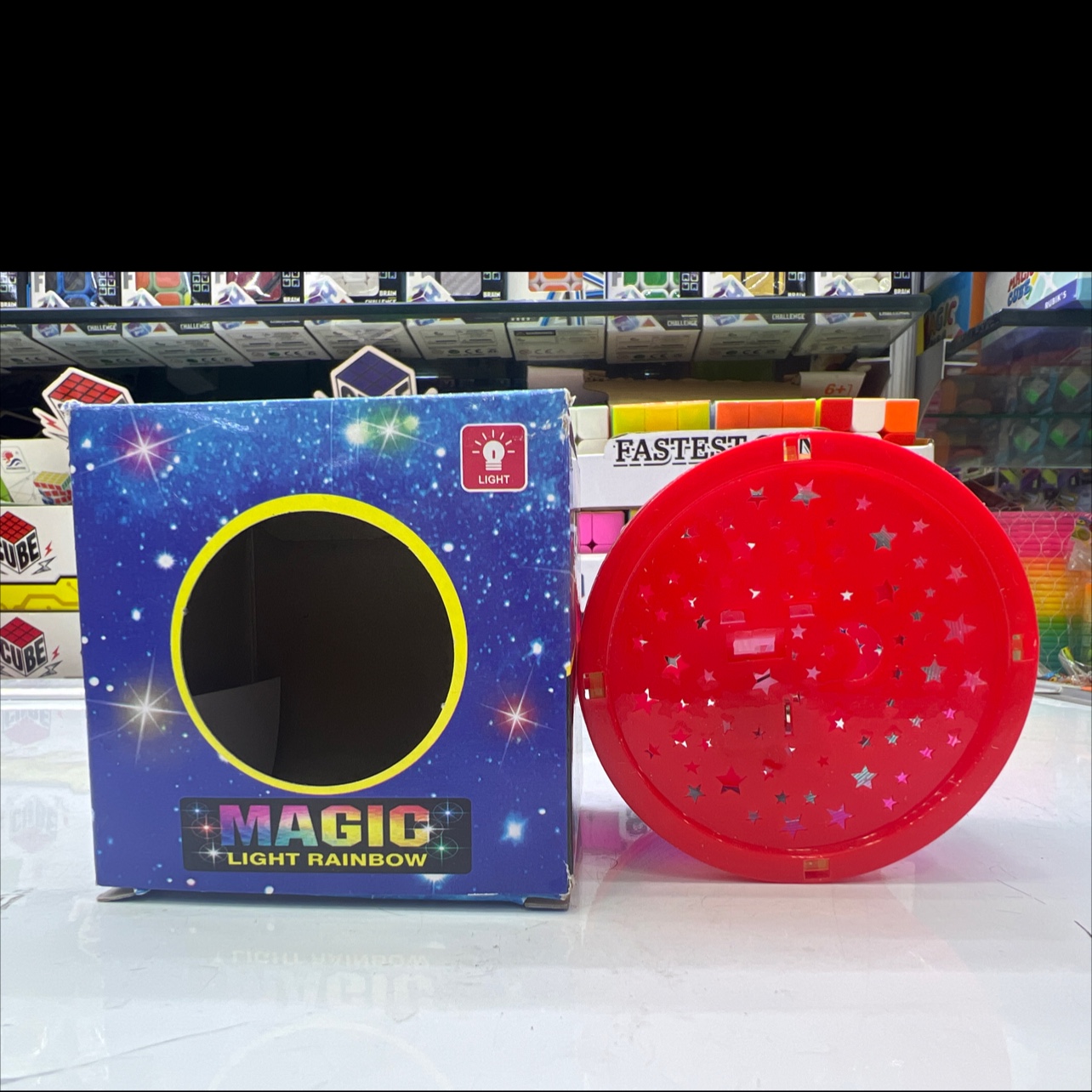8cm*8cm*6cm星月镂空彩虹圈儿童益智玩具带灯光弹力彩虹圈玩具批发