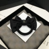 The exquisite medium-sized bow tie is simple and elegant. The black hair tie is versatile for daily use. The satin fabric headwear and hair flower are perfect for women details Picture