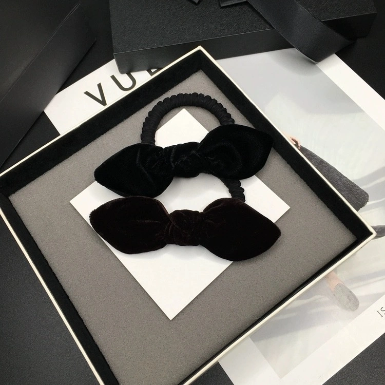 The velvet bow hair tie is simple and elegant. The velvet hair tie exudes a sense of style. The black bun hair loop leather case is highly elastic and feminine detail image 3