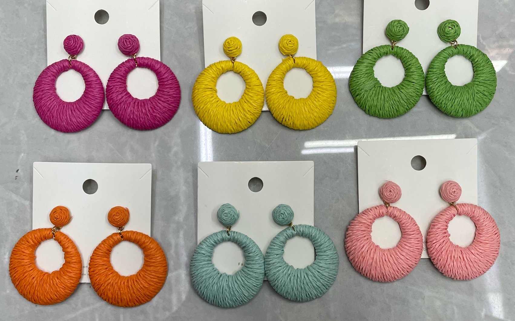 The 2024 cross-border bestseller Raffia grass woven earrings from Europe and America are high-end earrings