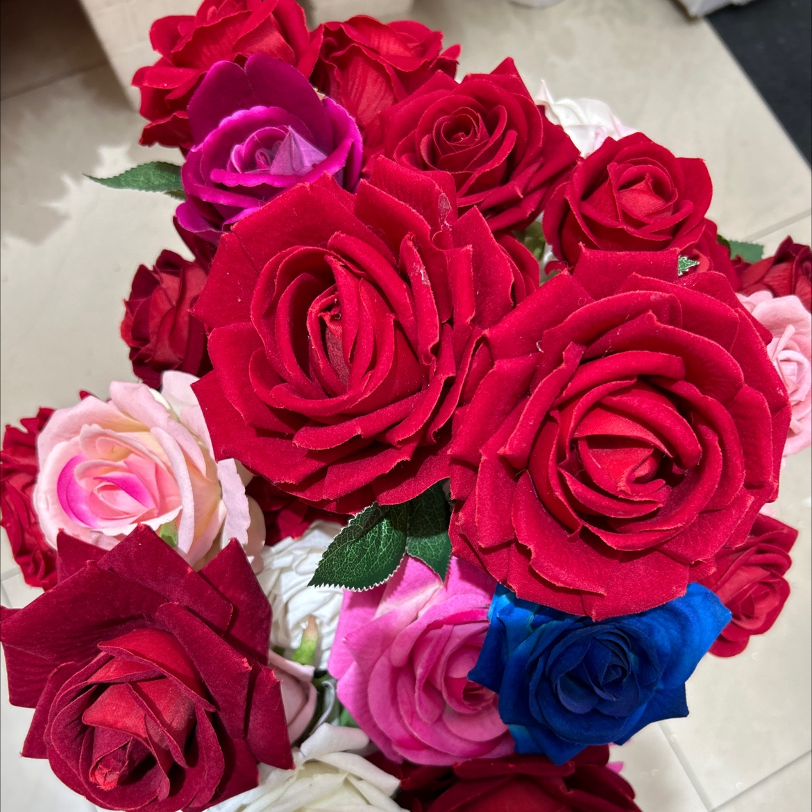 Single artificial velvet rose, large and small plastic flowers