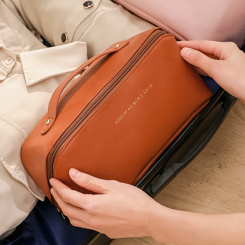PU organ pillow makeup bag, women's hand-held large-capacity travel portable, ins high-end style toiletry and makeup storage bag Specification image