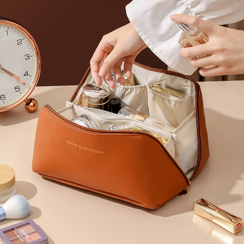 PU organ pillow makeup bag, women's hand-held large-capacity travel portable, ins high-end style toiletry and makeup storage bag details Picture